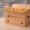 Caja para naranjas en entorno de almacén Caja para naranjas en almacén lista para envíos de fruta con cartón resistente